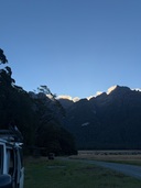 Sun behind the mountains at Kiosk Creek
