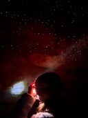 More glowworms under red torchlight